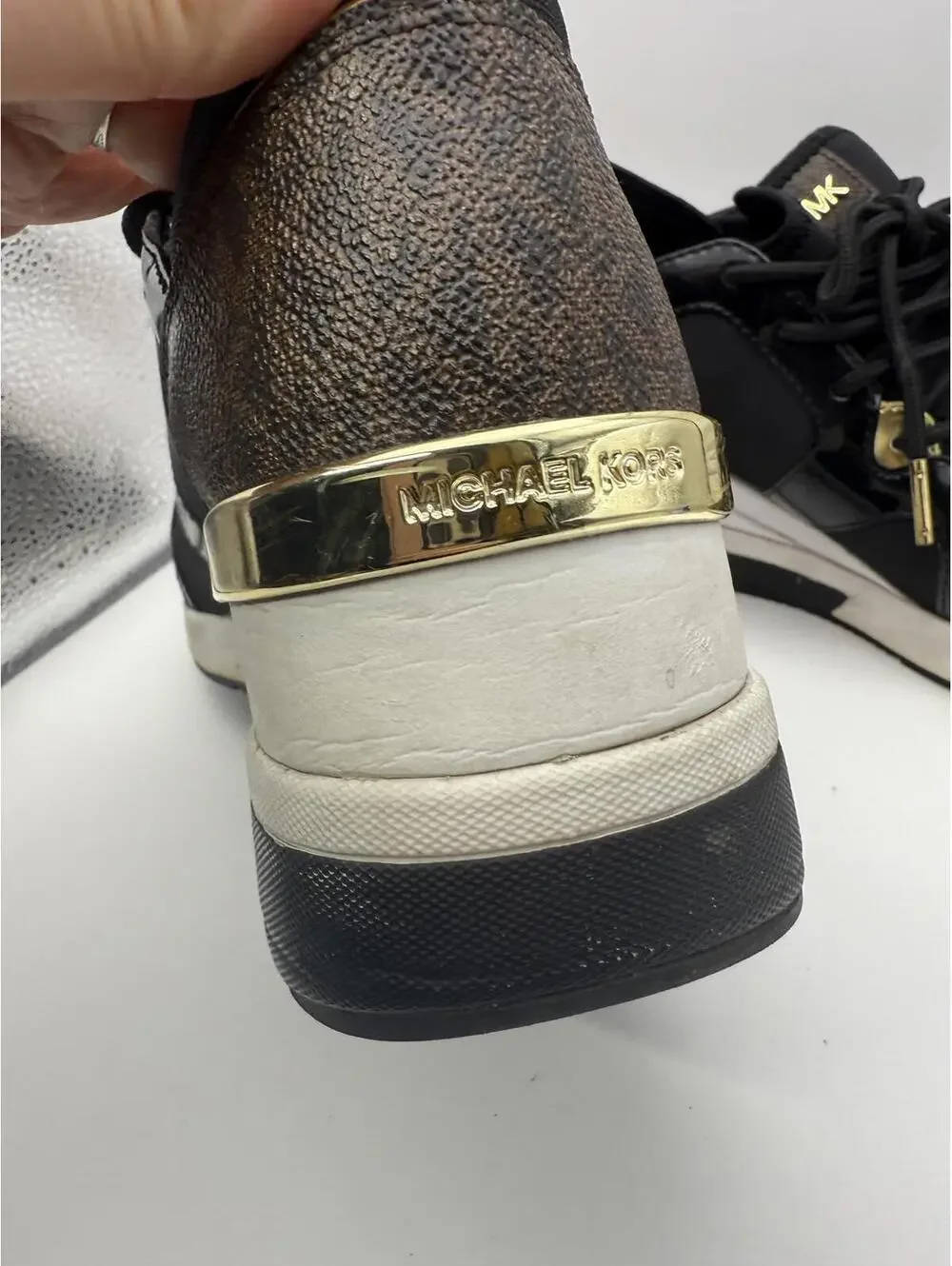 Michael Kors Women's Black and Gold Wedge Sneakers 8.5